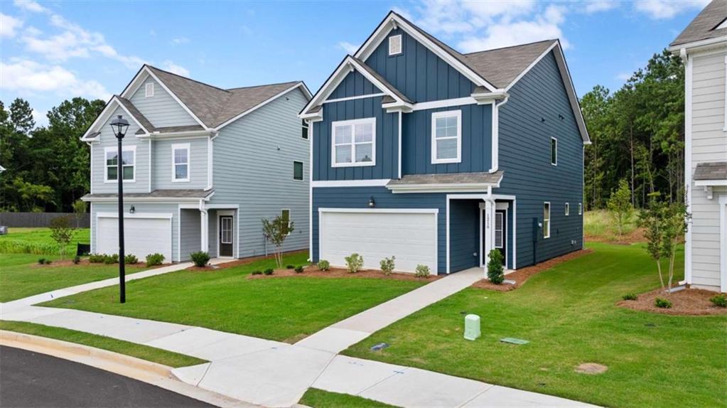 Photo of two story blue and white new construction home Waldon Park in Jonesboro. GA